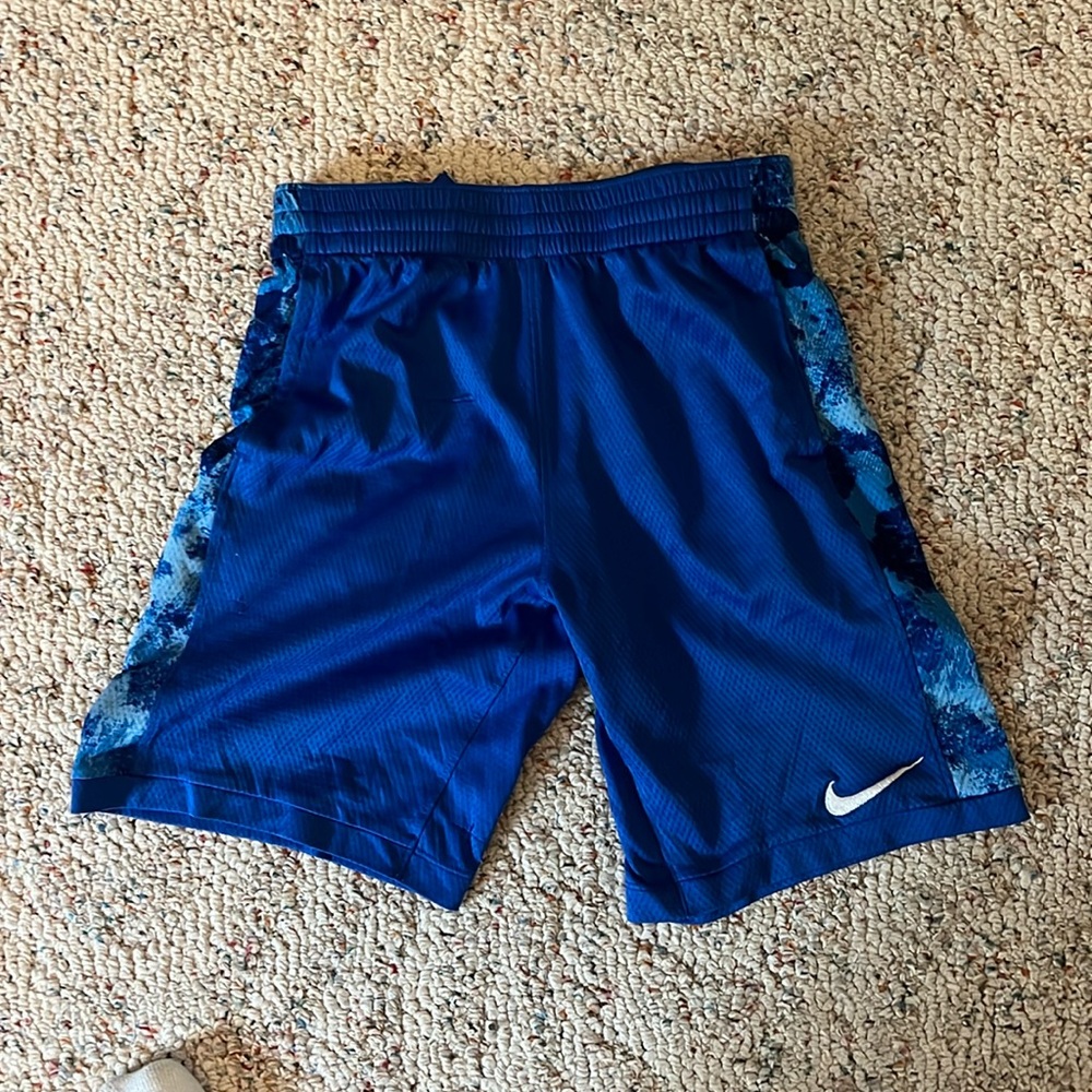 Blue Nike shorts